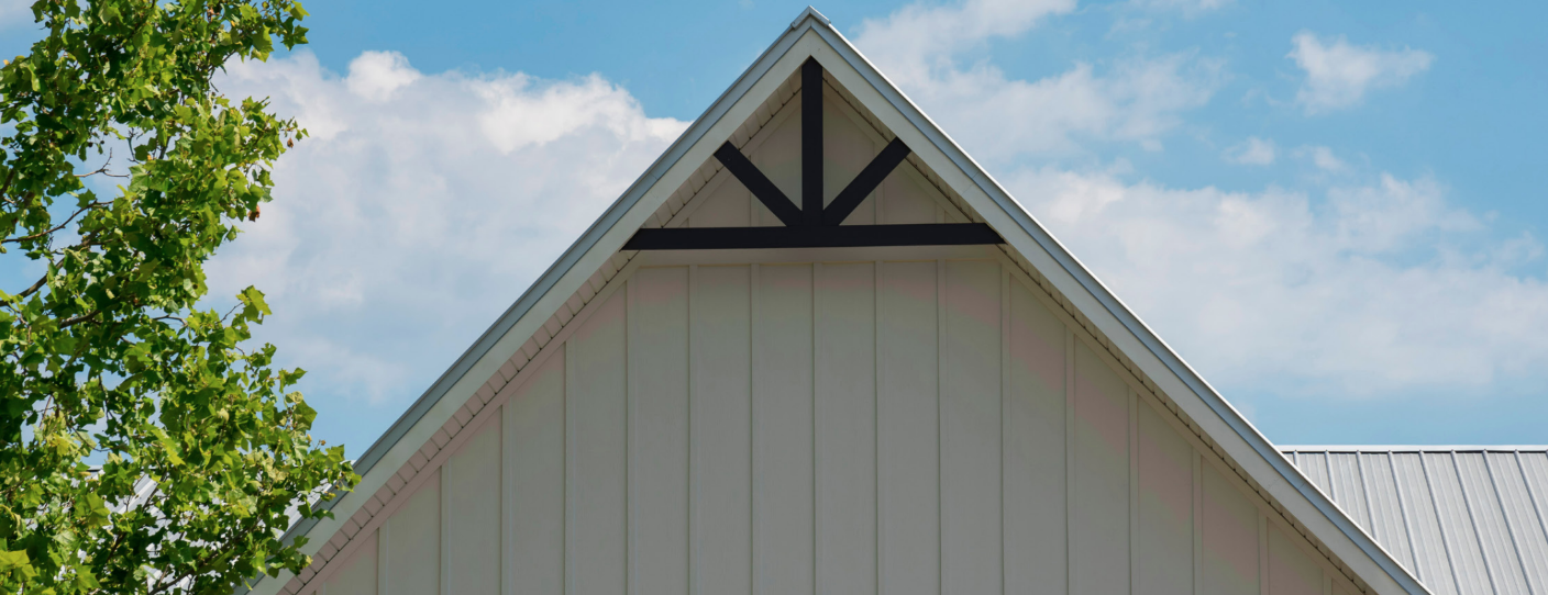 Stylish metal board and batten siding on a modern home